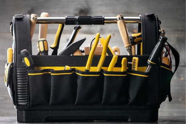 Tool bag filled with hand tools